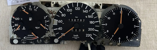 Mercedes-Benz W124 instrument cluster out of the car: fuel, temperature and oil gauges, speedometer and clock