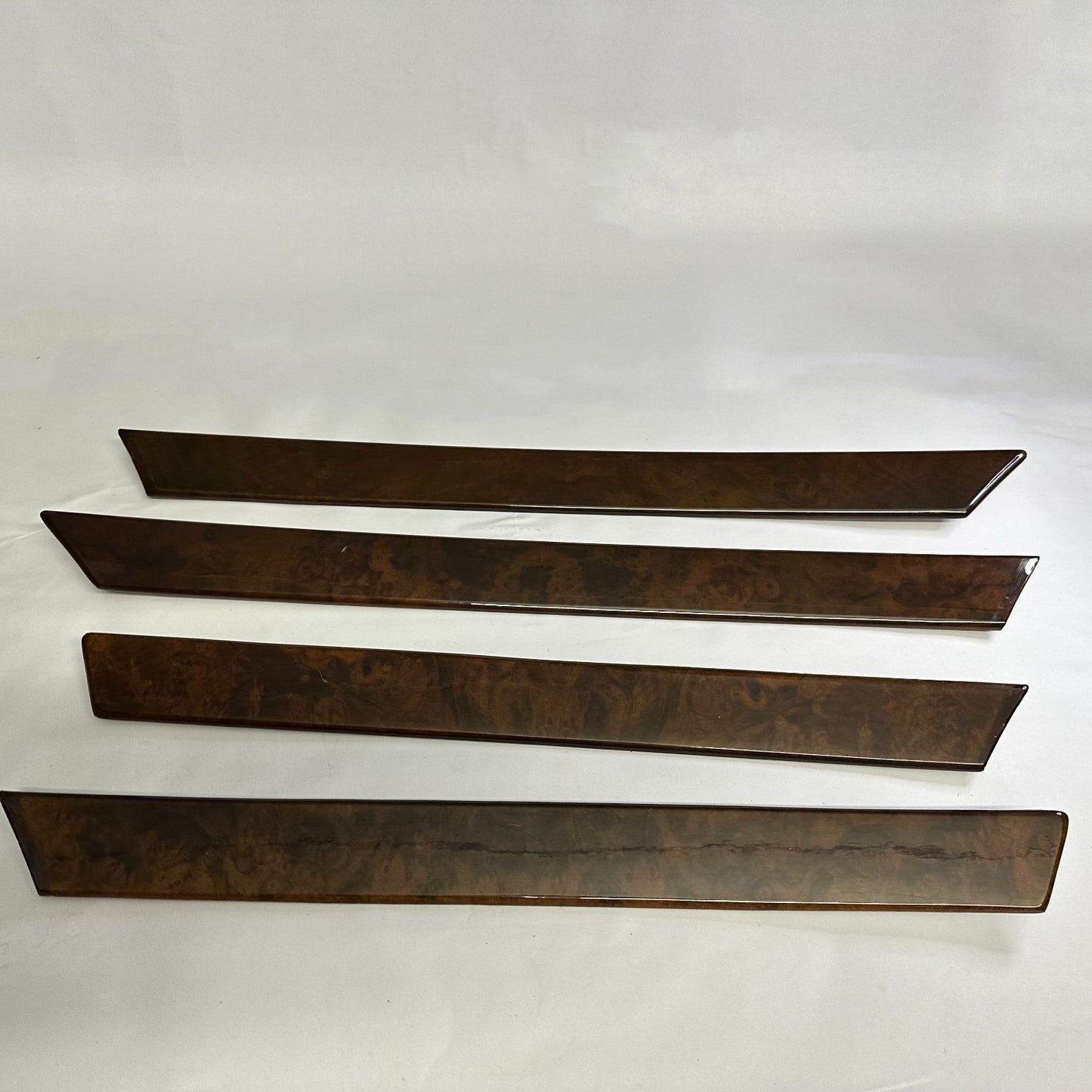 Genuine Mercedes-Benz W124 Burl Wood interior door trim set for manual rear window models, 4-piece set, OEM Wurzelnuss.