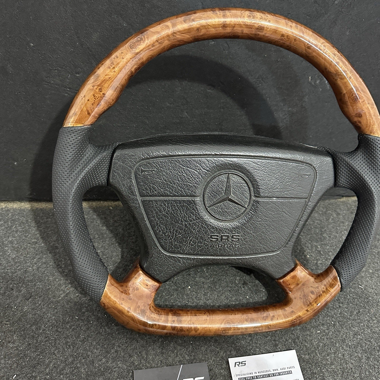 Custom Mercedes-Benz sport steering wheel with high-gloss Burl Wood and a flat-bottom D-cut design, compatible with W124, W140, and R129 models.