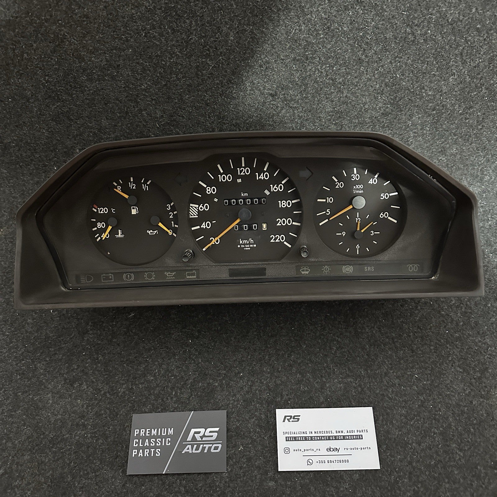 Complete Mercedes W124 Diesel instrument cluster assembly with tachometer and 220km/h speedometer, VDO OEM part A1245423801.