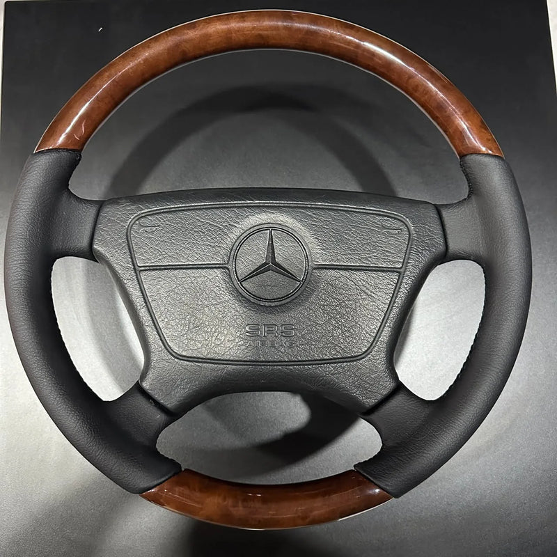 Refurbished Mercedes W140 and W202 steering wheel with burl wood rim and black leather grips