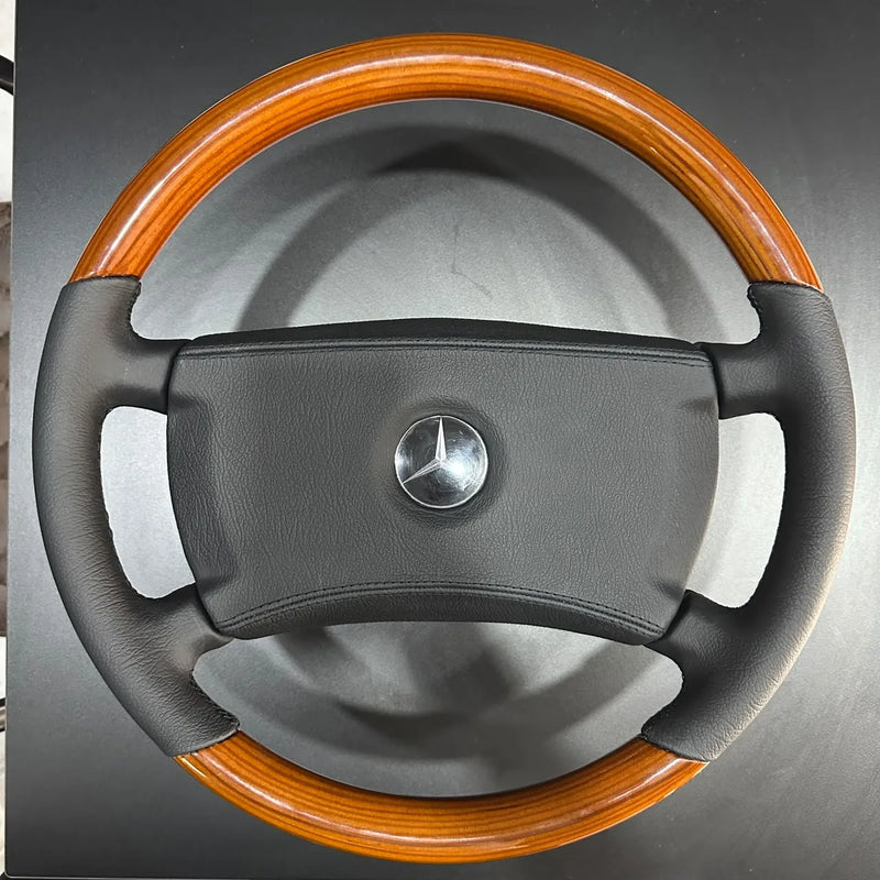 Refurbished classic Mercedes W123, W126 and R107 steering wheel with zebrano wood and black leather