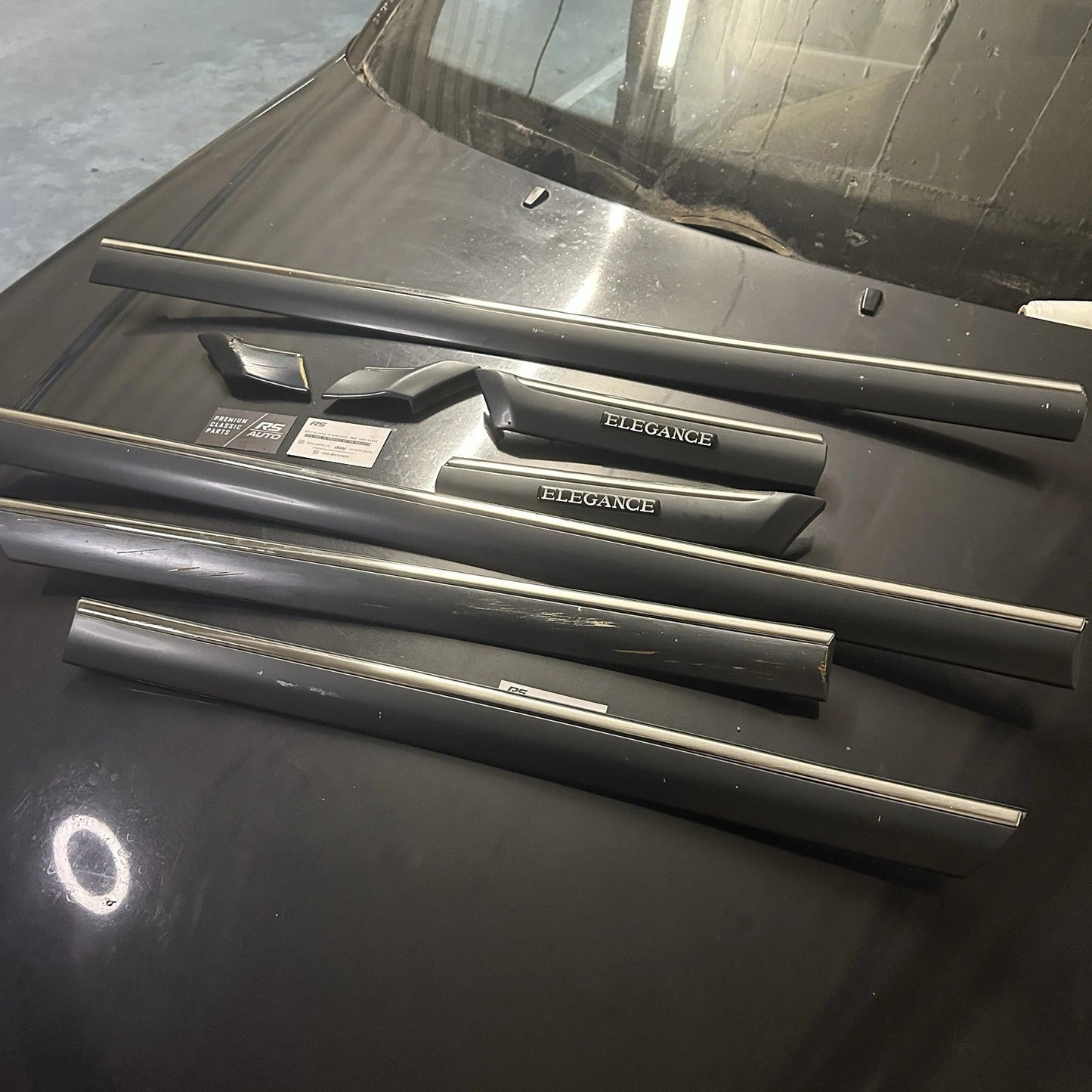 Complete 6-piece Mercedes-Benz W202 Elegance exterior trim set, chrome door mouldings.