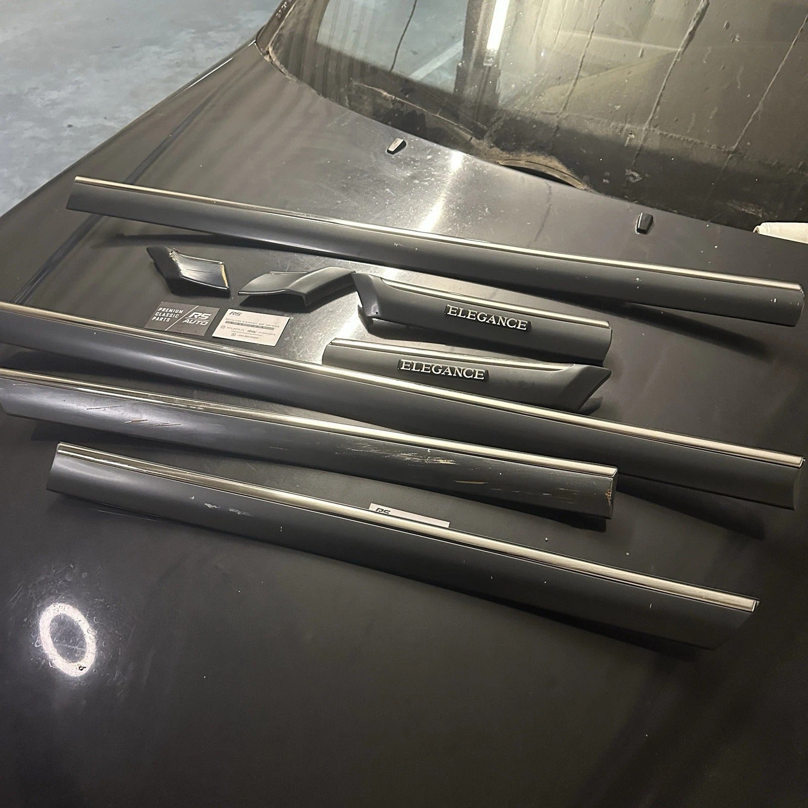 Complete 6-piece Mercedes-Benz W202 Elegance exterior trim set, chrome door mouldings.